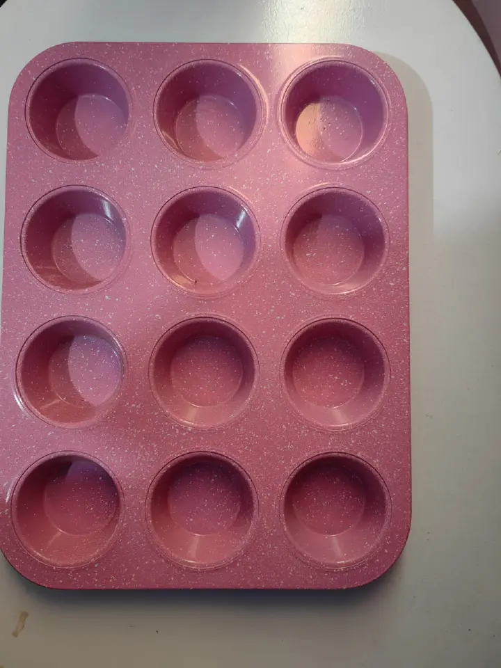 GOODCOOK MEGAGRIP 12-CUP MUFFIN PAN WITH SILICONE GRIP HANDLES PERFECT FOR CUPCAKES DURABLE HEAVY-GAUGE STEEL CONSTRUCTION SCRATCH-RESISTANT NONSTICK COATING PINK