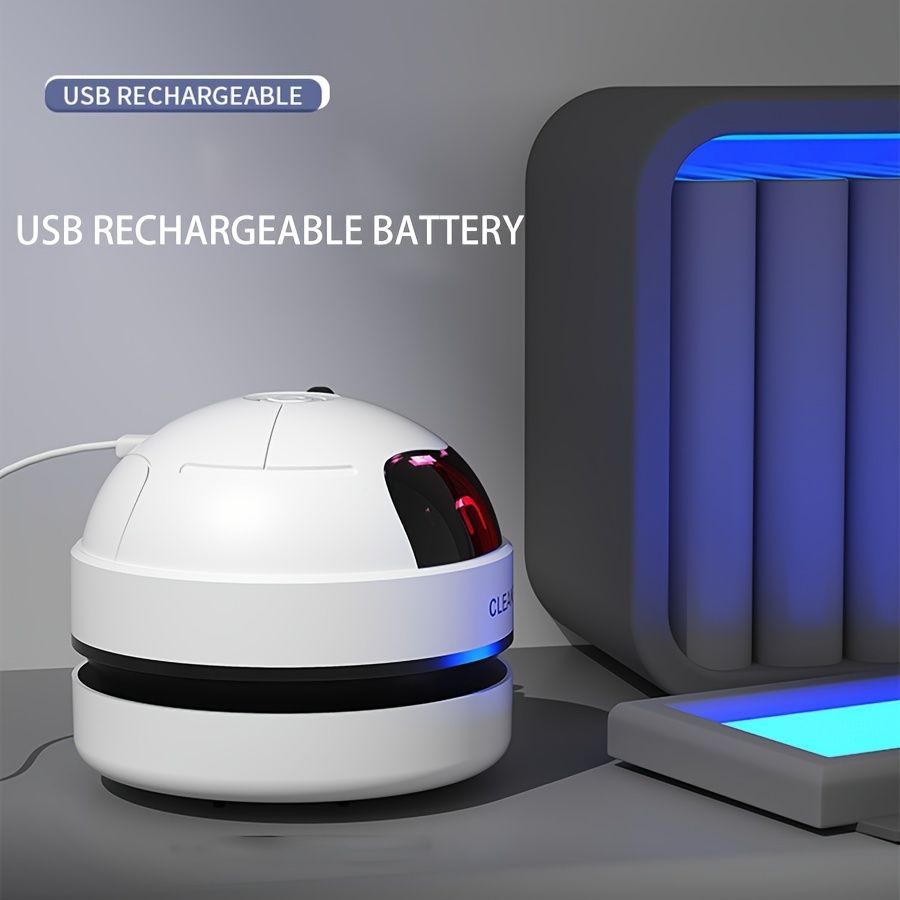 A Mini Desktop Vacuum Cleaner, Portable And Small, Powered by a Rechargeable USB Battery, Featuring a Cute Robot Design for Cleaning Desks Quietly, Picking Up Small Items Like Eraser Shavings And Debr