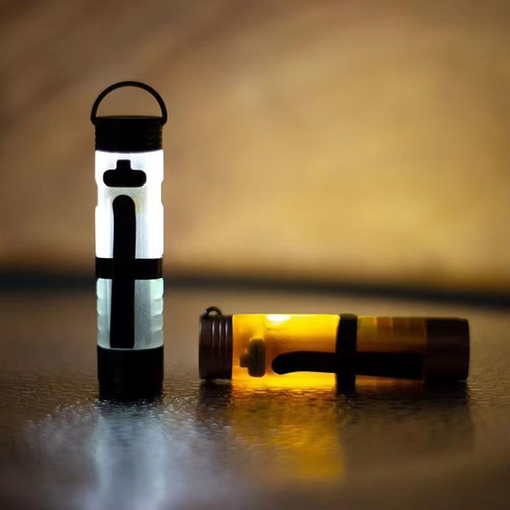 Pocket mini flashlight, outdoor key holder cap, portable LED key light, strong light pocket cap holder light, ambient light LED small light