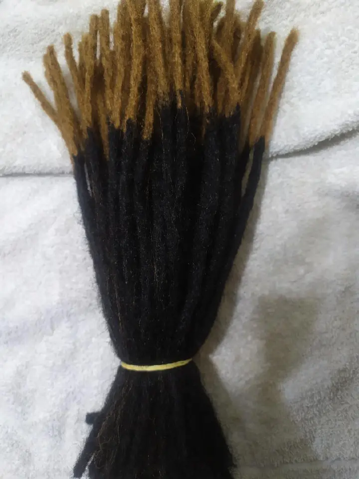 Artificial dreadlocks shoulder length Synthetic Dreadlocks fall into the hair extensions category because the individual locs are attached to your natural hair. This can be accomplished by the extensi