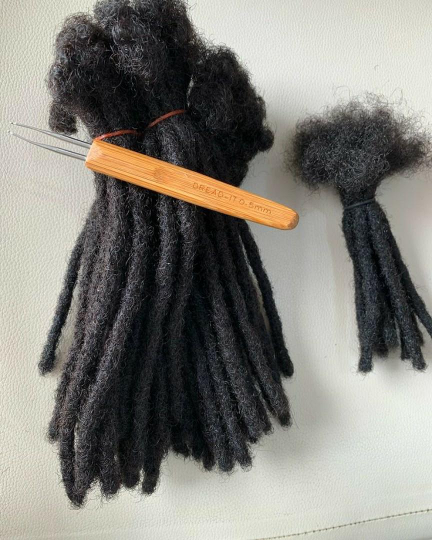 Handmade artificial dreadlocks can indirectly support hair growth by providing a protective hairstyle that minimizes damage and breakage. They offer a low-maintenance option that reduces the