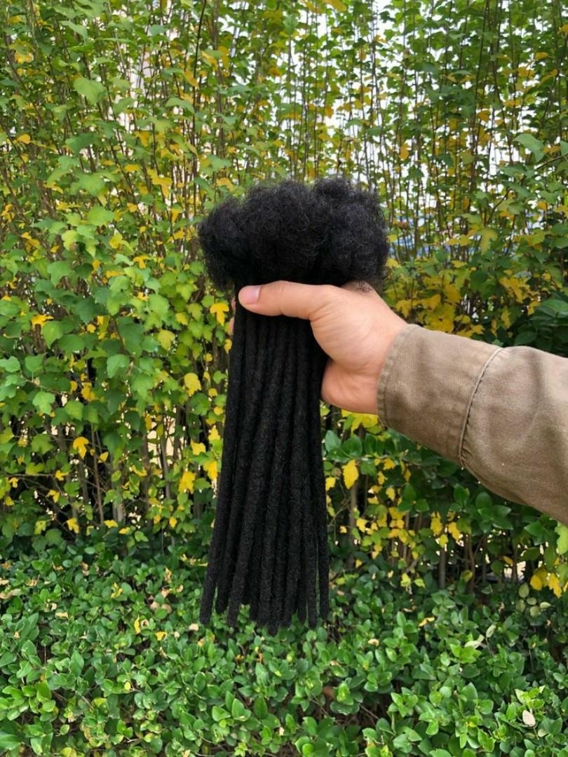 Handmade artificial dreadlocks can indirectly support hair growth by providing a protective hairstyle that minimizes damage and breakage. They offer a low-maintenance option that reduces the
