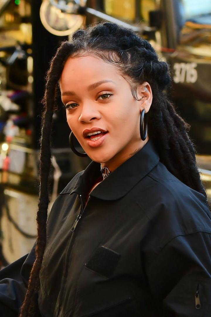 Riri locs are a bold variation of faux locs, known for their thicker, chunkier appearance. This style exudes confidence and a carefree flair, often featuring a slightly undone, textured finish. These
