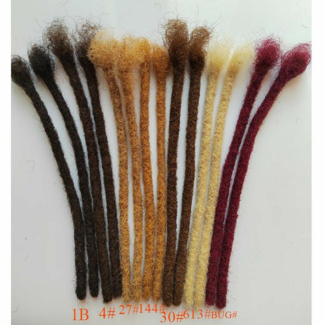 Artificial dreadlock extensions are pre-made dreadlock-like strands, typically made of synthetic hair, that are attached to natural hair to create the appearance of dreadlocks without the long-term co