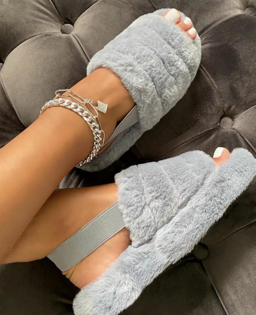 Fancy Fluffy high-quality shoes.FLUFFY are made from premium suede and lined with genuine sheeps wool, which provides your feet with ample warmth. The supple suede upper provides a touch of elegance,