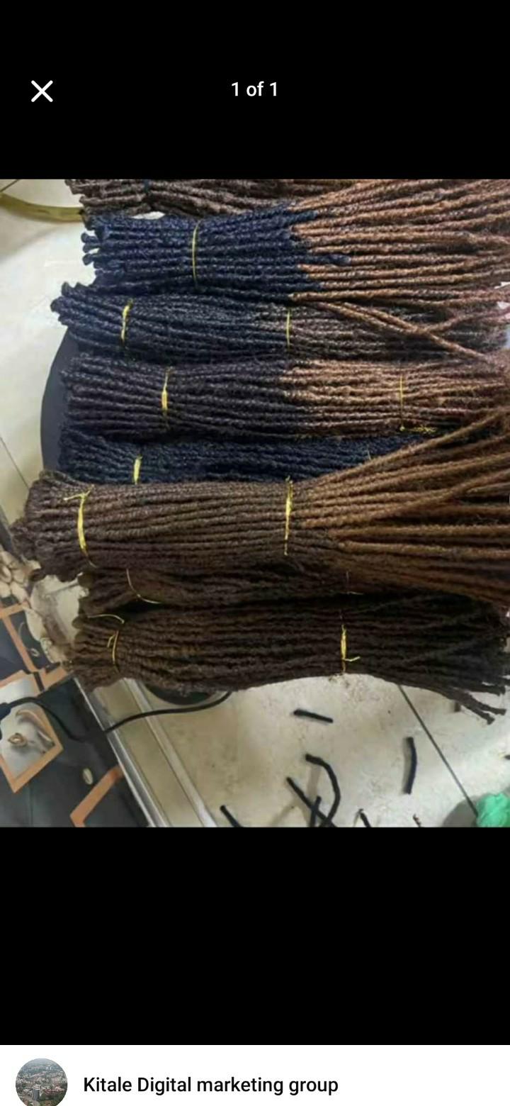 Ug locs 80pieces.Ug locs extensions" refers to dreadlock extensions installed by loc specialists in Uganda, often using artificial dreadlock extensions or natural human hair to add length and volume t