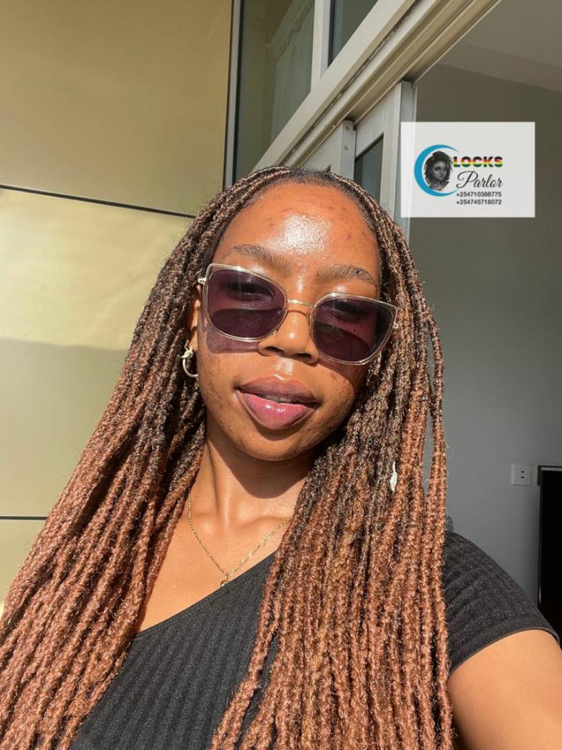 Ug locs 80pieces.Ug locs extensions" refers to dreadlock extensions installed by loc specialists in Uganda, often using artificial dreadlock extensions or natural human hair to add length and volume t