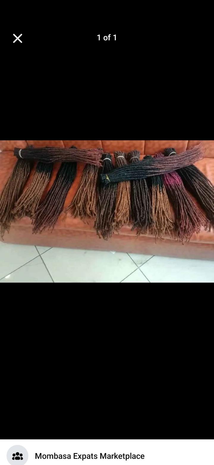 Ug locs 80pieces.Ug locs extensions" refers to dreadlock extensions installed by loc specialists in Uganda, often using artificial dreadlock extensions or natural human hair to add length and volume t