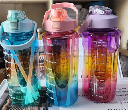 3 in 1 Motivational water bottle with time stamps, leak proof cup with straw and safety lock, adjustable strap. Made of food grade plastic bottle and silicone straw, convenient for drinking water.