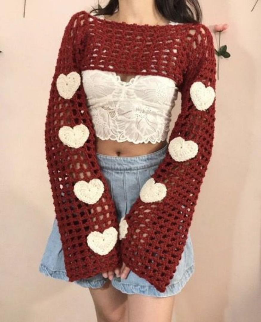 Crochet shrug with flowers and closed sleeves