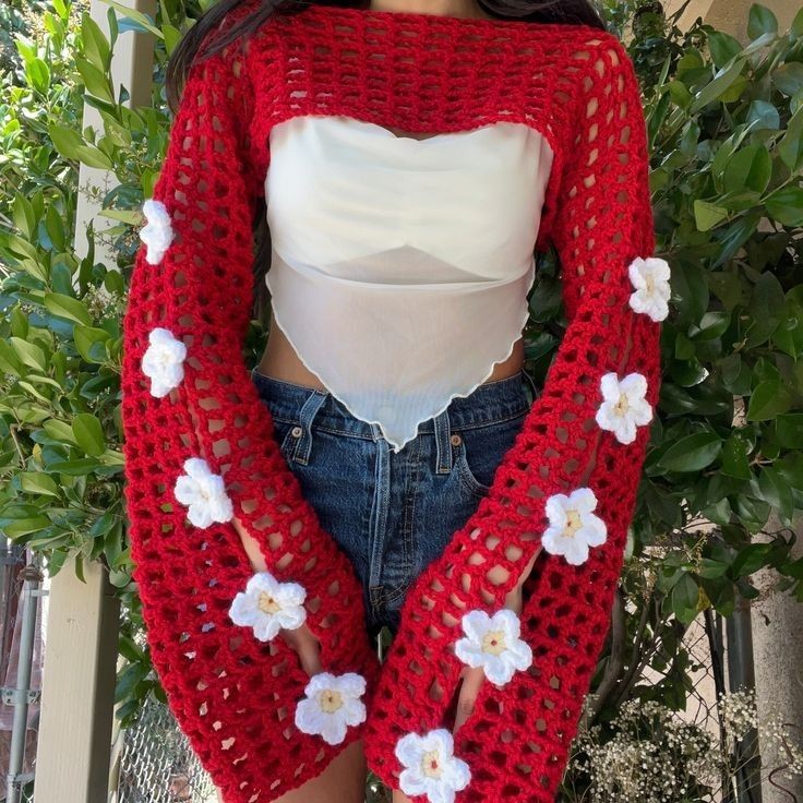 Crochet shrug with flowers and closed sleeves