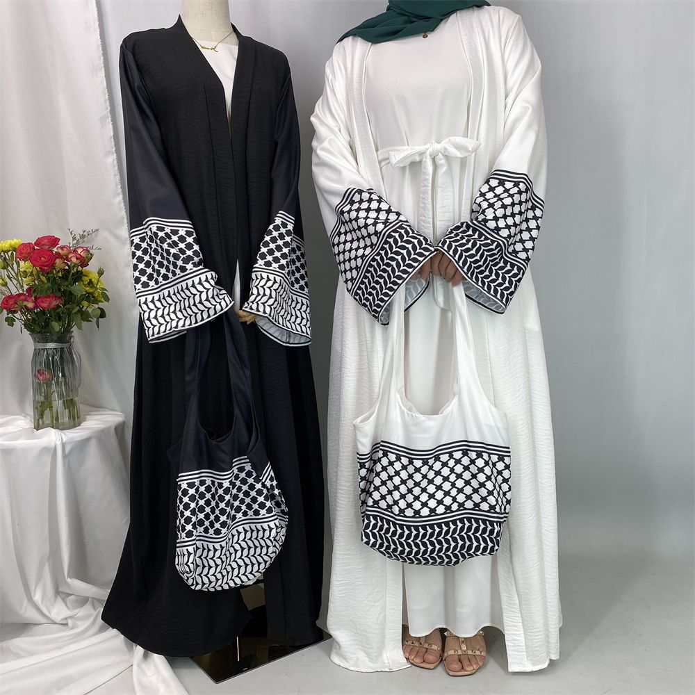 A new fashionable cardigan dress for Middle Eastern Muslims in Dubai, Turkey and Arabia during Ramadan, paired with a mini bag