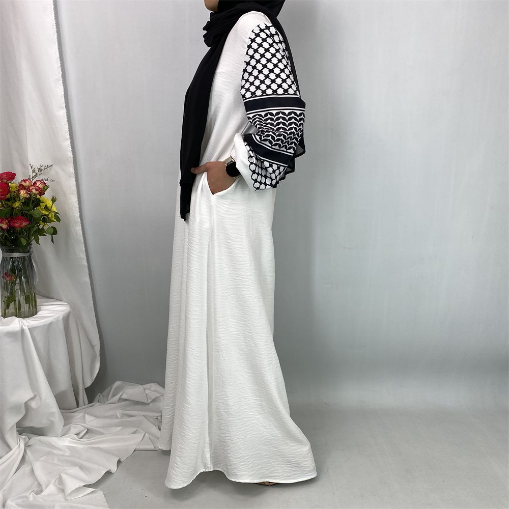 Turkish Muslim fashion women's dress with a hat in Dubai, Middle East, and Islamic elegant women's long dress