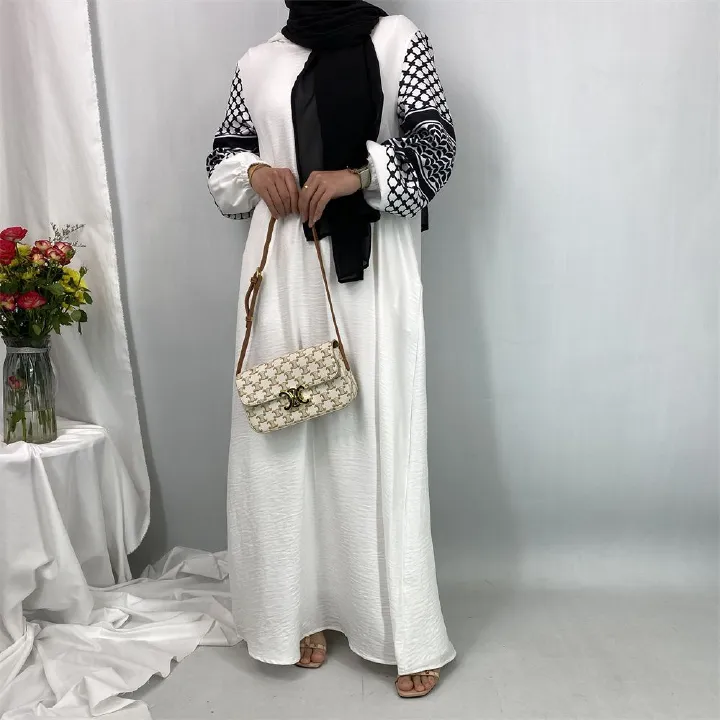 Turkish Muslim fashion women's dress with a hat in Dubai, Middle East, and Islamic elegant women's long dress