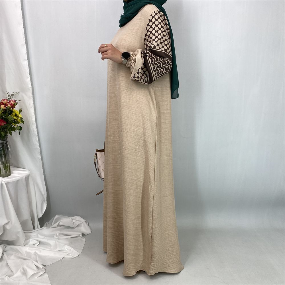 Turkish Muslim fashion women's dress with a hat in Dubai, Middle East, and Islamic elegant women's long dress