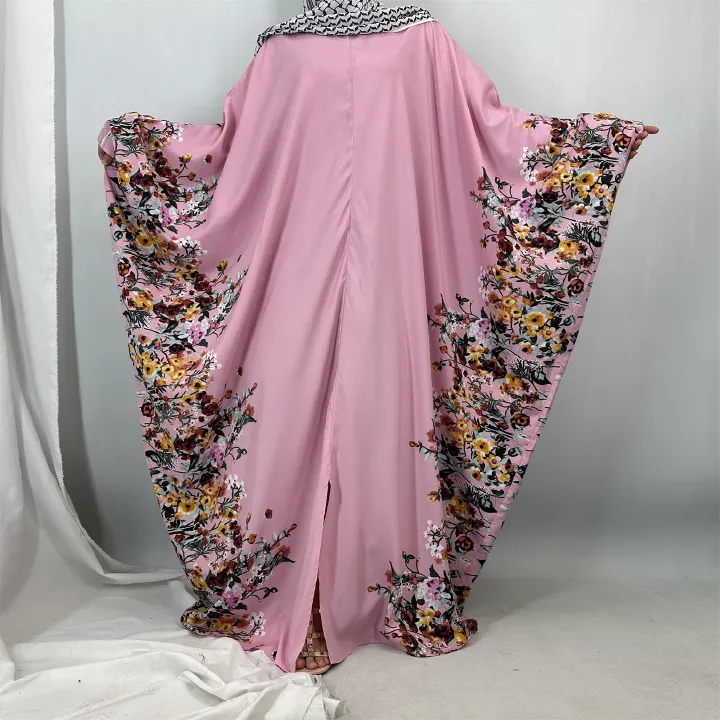 New fashionable flower-patterned printed robes for Middle Eastern Muslims and batsleeved dresses for Arab Islamic women in Dubai