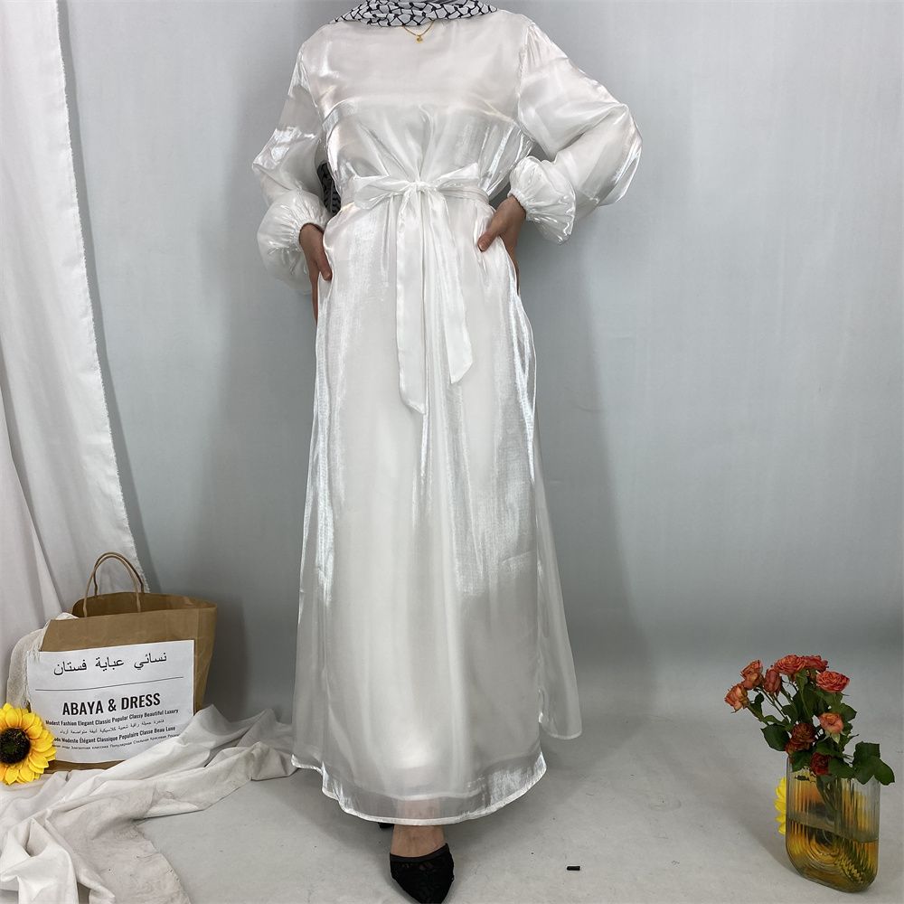 A new, fashionable, fresh, sweet and shiny satin dress for the Muslim Ramadan in Turkey, Africa and Arabia