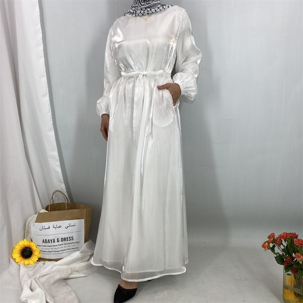 A new, fashionable, fresh, sweet and shiny satin dress for the Muslim Ramadan in Turkey, Africa and Arabia