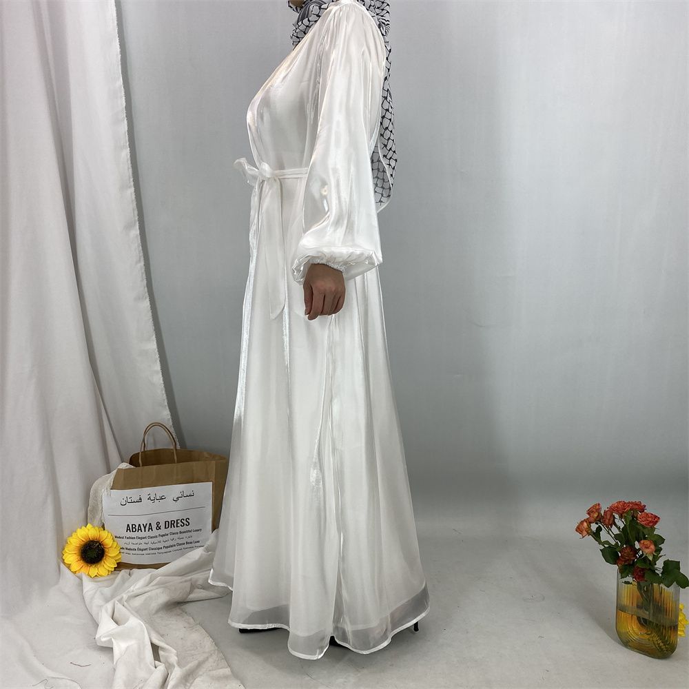 A new, fashionable, fresh, sweet and shiny satin dress for the Muslim Ramadan in Turkey, Africa and Arabia