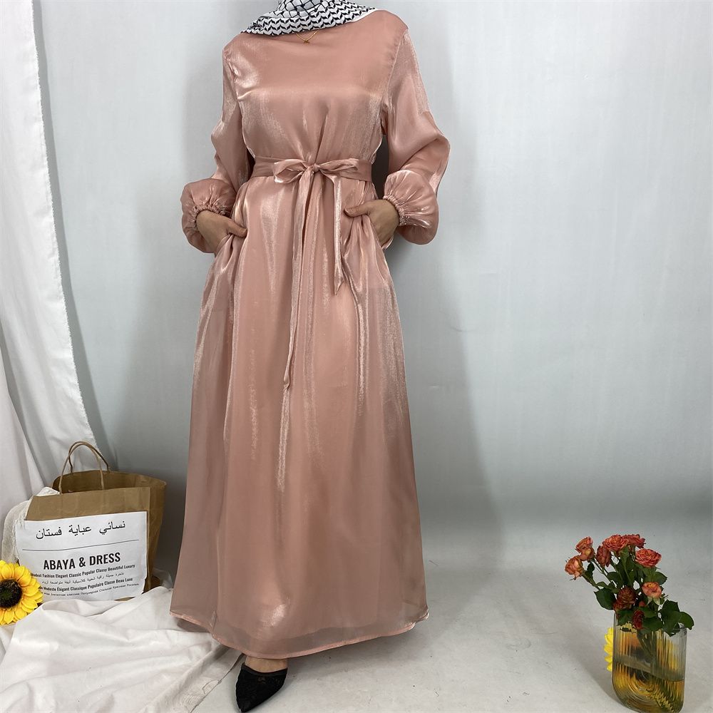 A new, fashionable, fresh, sweet and shiny satin dress for the Muslim Ramadan in Turkey, Africa and Arabia