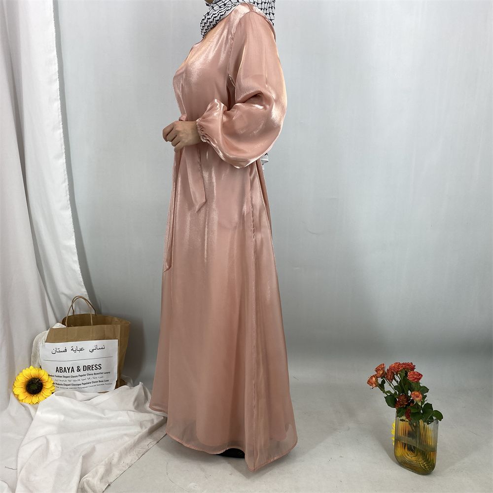 A new, fashionable, fresh, sweet and shiny satin dress for the Muslim Ramadan in Turkey, Africa and Arabia