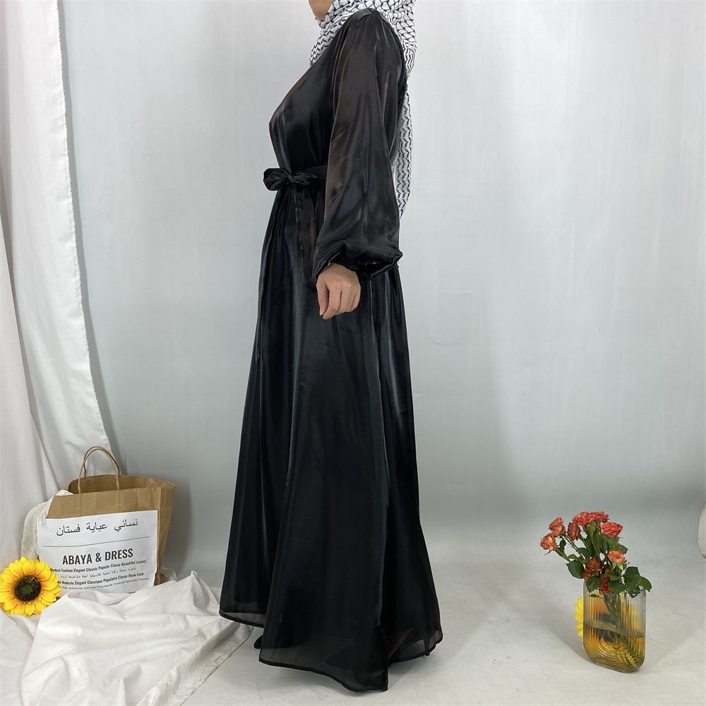 A new, fashionable, fresh, sweet and shiny satin dress for the Muslim Ramadan in Turkey, Africa and Arabia