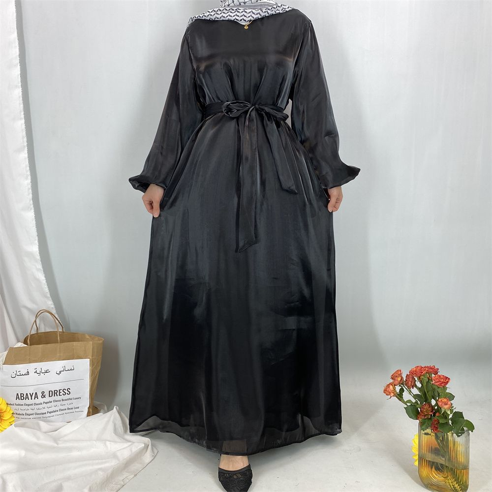 A new, fashionable, fresh, sweet and shiny satin dress for the Muslim Ramadan in Turkey, Africa and Arabia