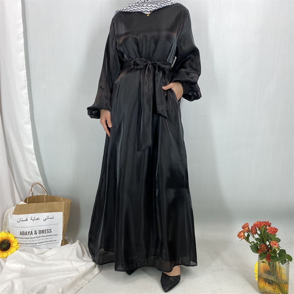 A new, fashionable, fresh, sweet and shiny satin dress for the Muslim Ramadan in Turkey, Africa and Arabia