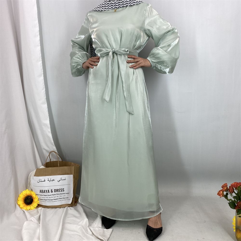 A new, fashionable, fresh, sweet and shiny satin dress for the Muslim Ramadan in Turkey, Africa and Arabia