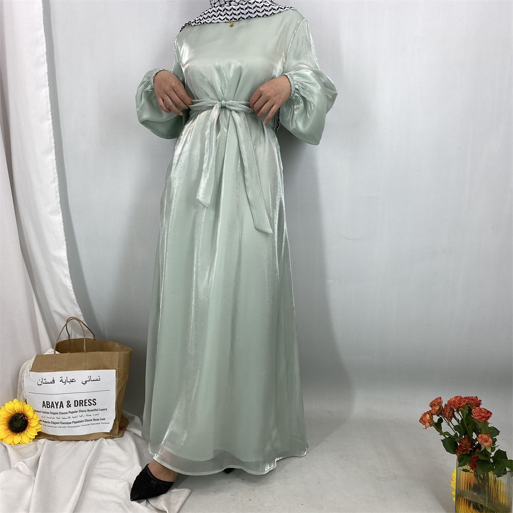 A new, fashionable, fresh, sweet and shiny satin dress for the Muslim Ramadan in Turkey, Africa and Arabia