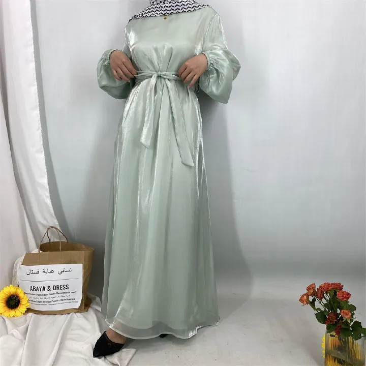 A new, fashionable, fresh, sweet and shiny satin dress for the Muslim Ramadan in Turkey, Africa and Arabia