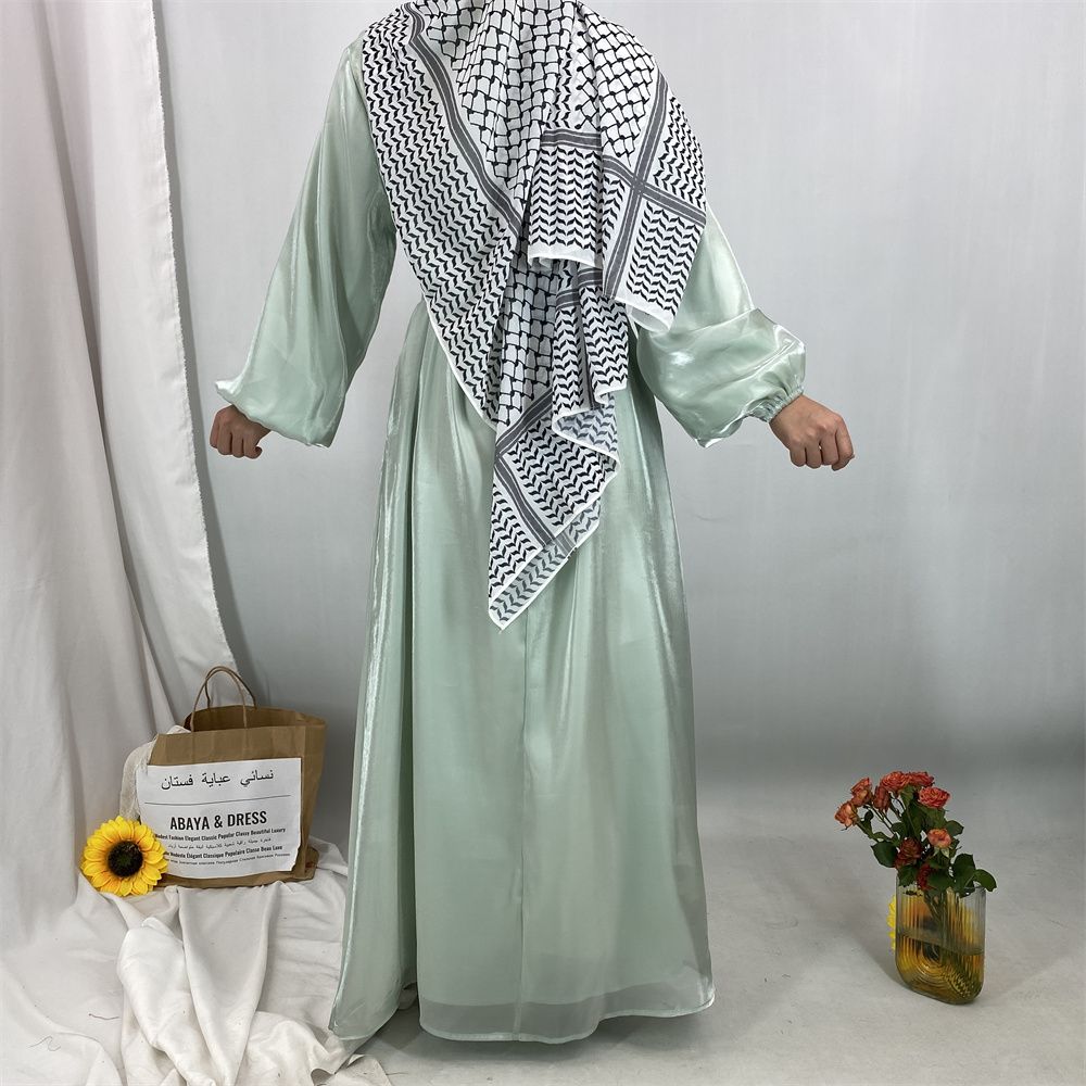 A new, fashionable, fresh, sweet and shiny satin dress for the Muslim Ramadan in Turkey, Africa and Arabia