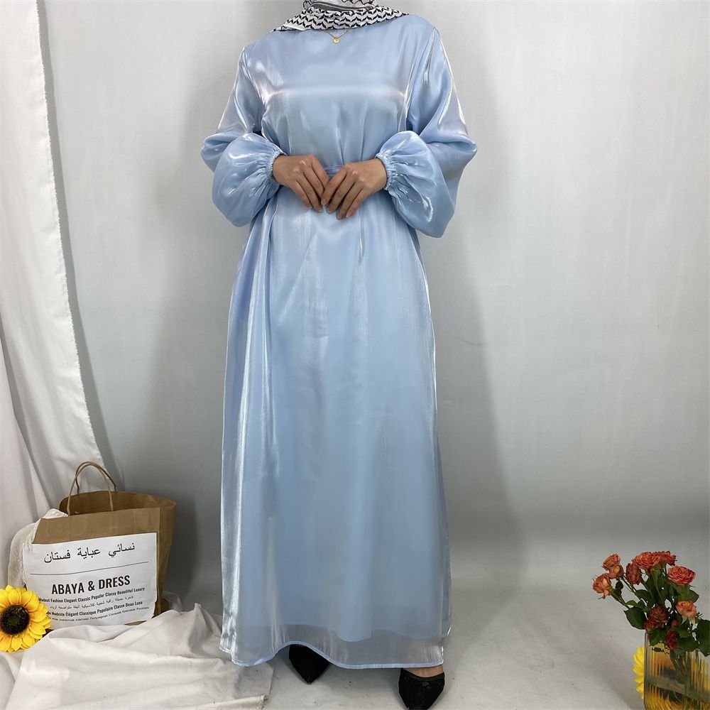 A new, fashionable, fresh, sweet and shiny satin dress for the Muslim Ramadan in Turkey, Africa and Arabia