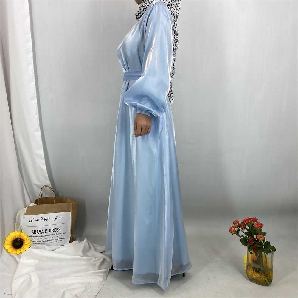 A new, fashionable, fresh, sweet and shiny satin dress for the Muslim Ramadan in Turkey, Africa and Arabia