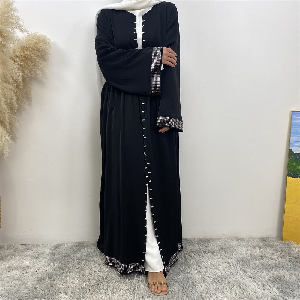 The Middle Eastern Muslim Ramadan is elegant and refined, with diamond and beaded designs. The Muslim cardigan from Turkey and Dubai is a fashionable long dress with pockets