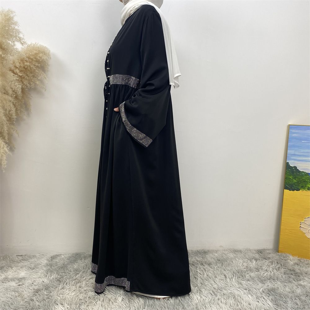 The Middle Eastern Muslim Ramadan is elegant and refined, with diamond and beaded designs. The Muslim cardigan from Turkey and Dubai is a fashionable long dress with pockets