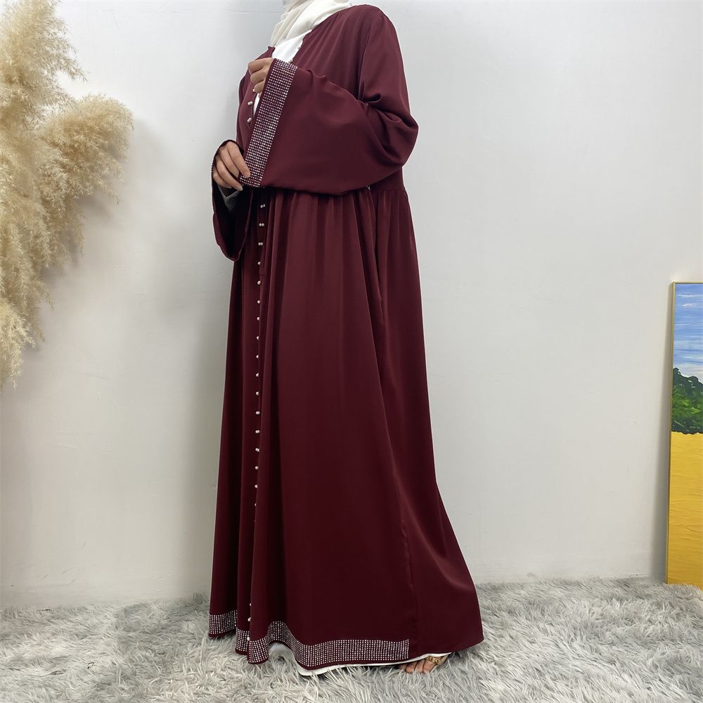 The Middle Eastern Muslim Ramadan is elegant and refined, with diamond and beaded designs. The Muslim cardigan from Turkey and Dubai is a fashionable long dress with pockets