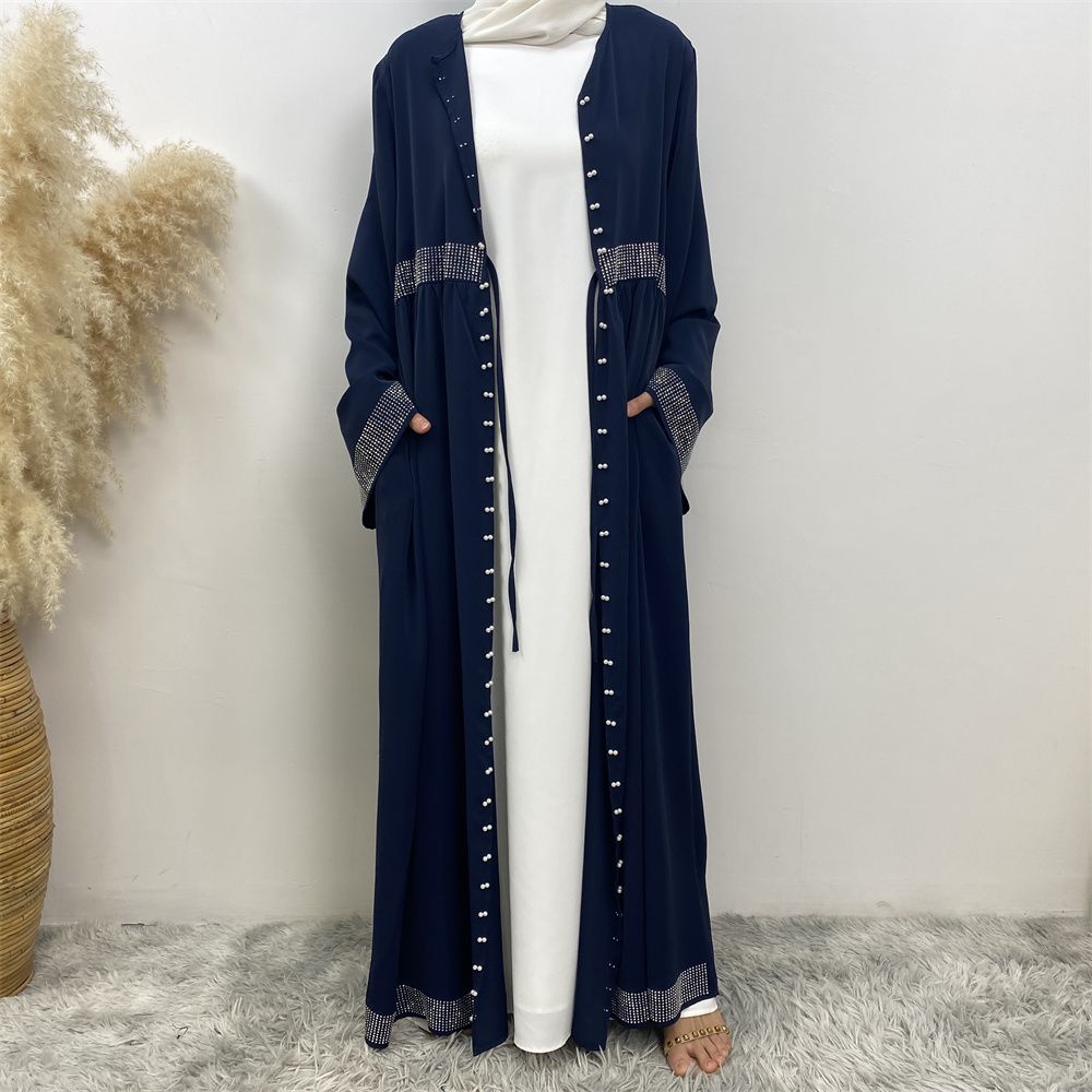 The Middle Eastern Muslim Ramadan is elegant and refined, with diamond and beaded designs. The Muslim cardigan from Turkey and Dubai is a fashionable long dress with pockets