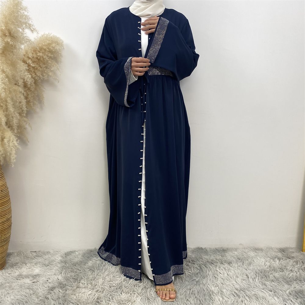 The Middle Eastern Muslim Ramadan is elegant and refined, with diamond and beaded designs. The Muslim cardigan from Turkey and Dubai is a fashionable long dress with pockets
