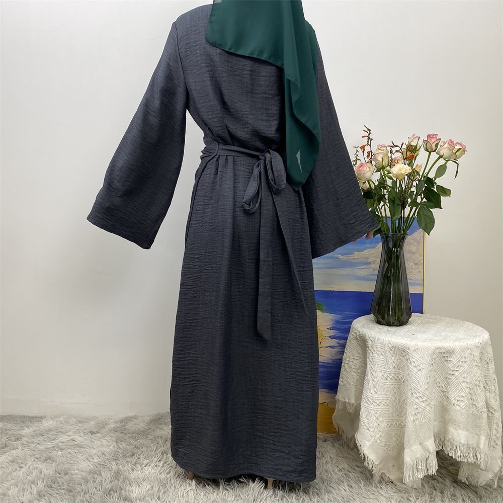 A Turkish plain color belt side pocket Muslim Islamic elegant robe dress from Dubai, Middle East