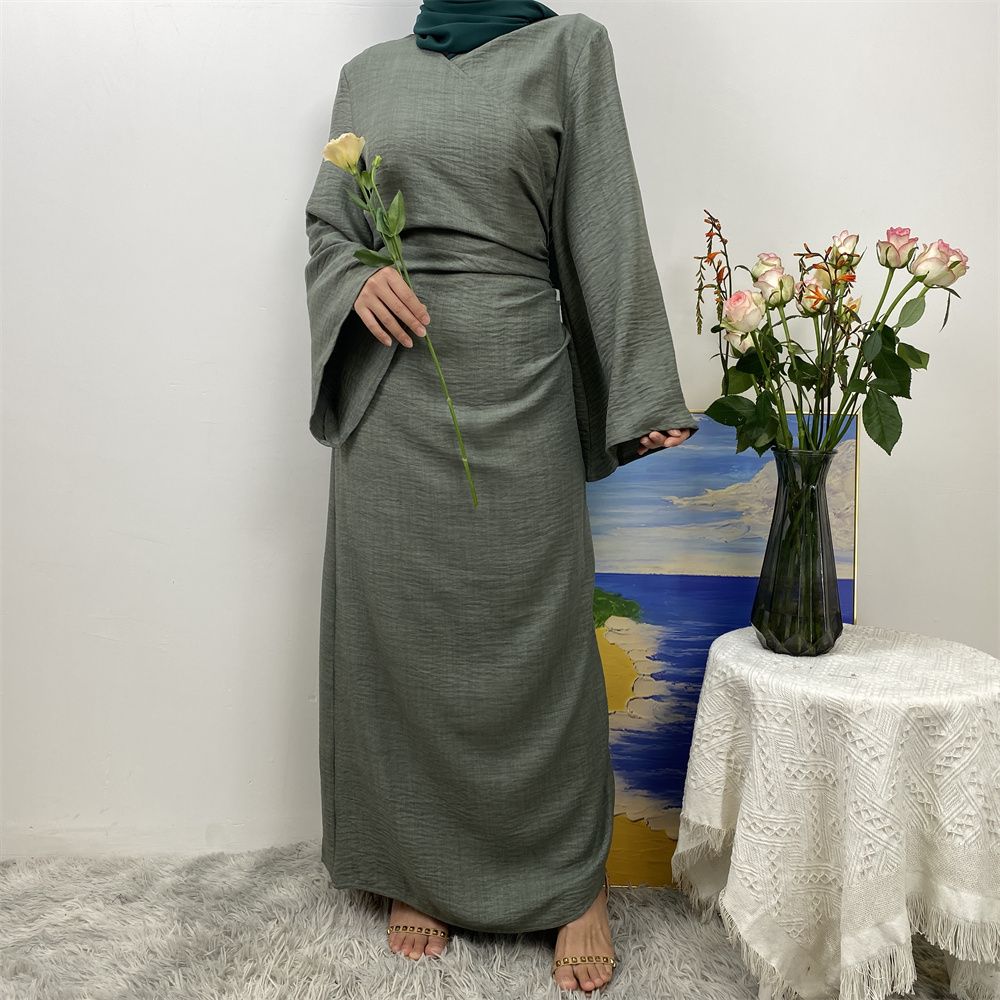 A Turkish plain color belt side pocket Muslim Islamic elegant robe dress from Dubai, Middle East
