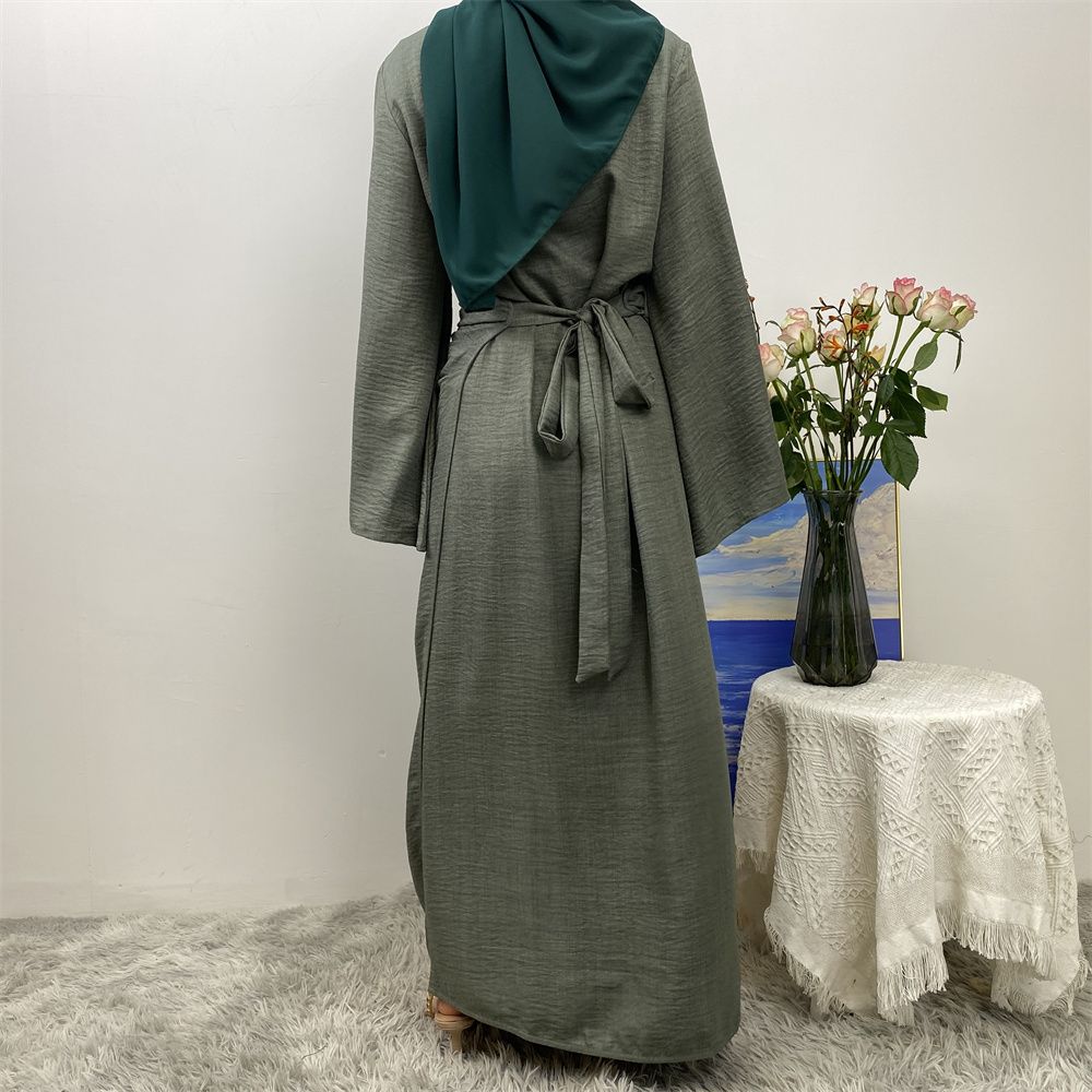 A Turkish plain color belt side pocket Muslim Islamic elegant robe dress from Dubai, Middle East