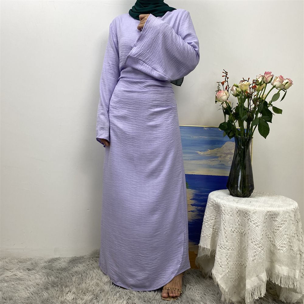 A Turkish plain color belt side pocket Muslim Islamic elegant robe dress from Dubai, Middle East