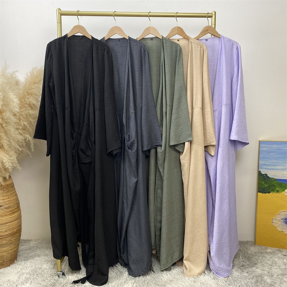 A Turkish plain color belt side pocket Muslim Islamic elegant robe dress from Dubai, Middle East