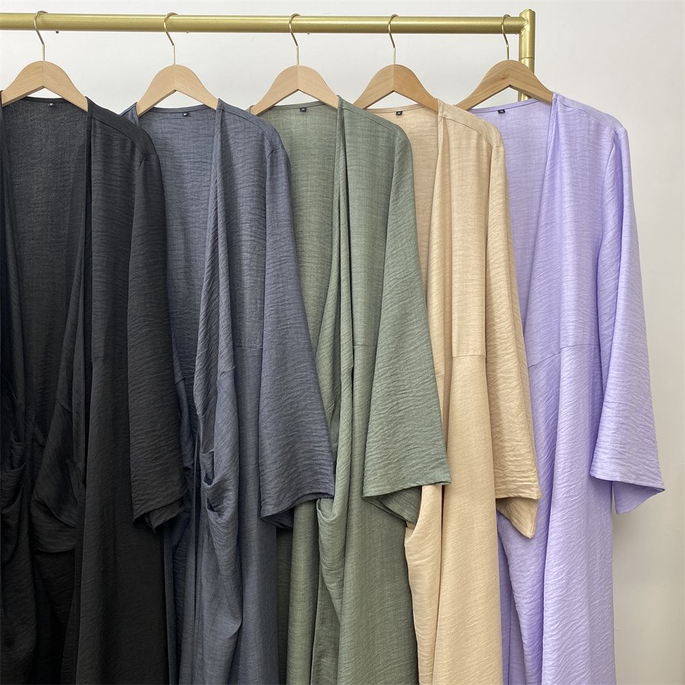 A Turkish plain color belt side pocket Muslim Islamic elegant robe dress from Dubai, Middle East