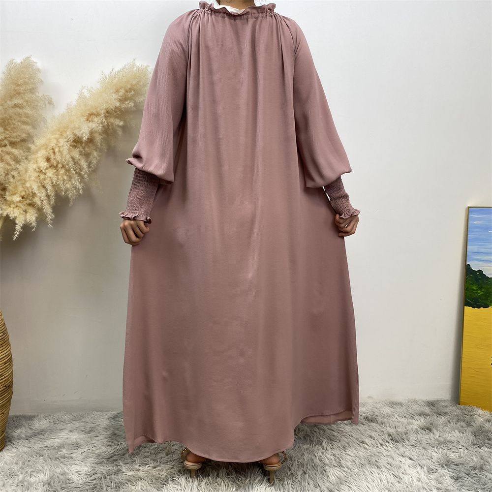 A new, fashionable and simple solid-color Muslim women's dress exclusively for cross-border supply from the Middle East, Turkey, Dubai and Arab countries