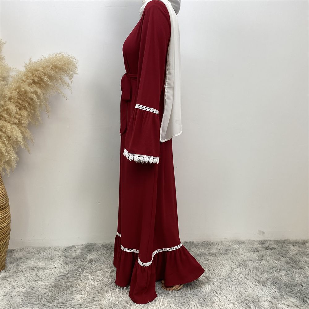 A Muslim Dubai Turkish Arab dress with white lace and front zipper and large hem is on sale in East Dubai