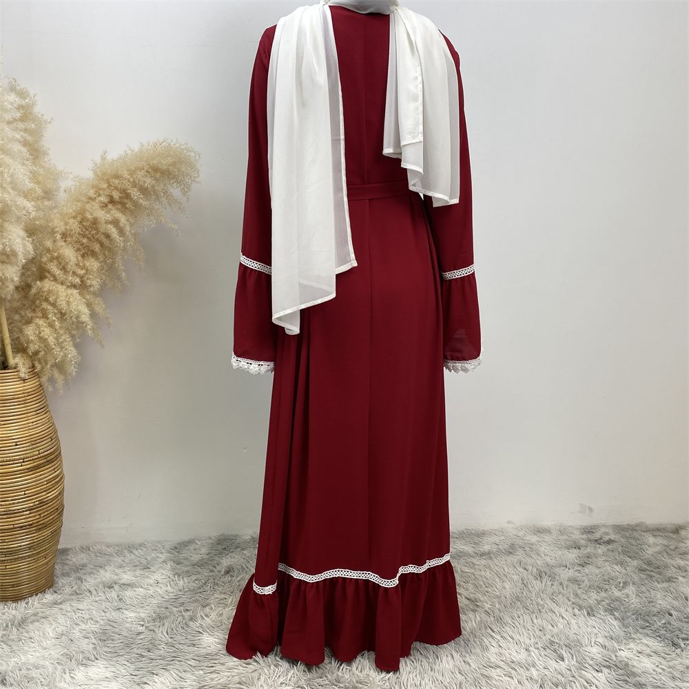 A Muslim Dubai Turkish Arab dress with white lace and front zipper and large hem is on sale in East Dubai
