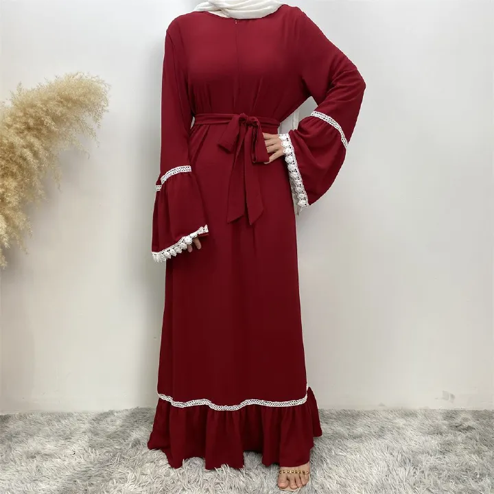 A Muslim Dubai Turkish Arab dress with white lace and front zipper and large hem is on sale in East Dubai