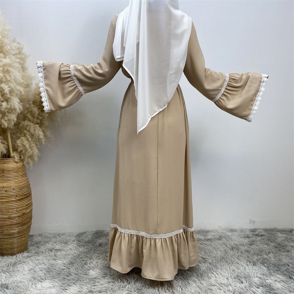 A Muslim Dubai Turkish Arab dress with white lace and front zipper and large hem is on sale in East Dubai